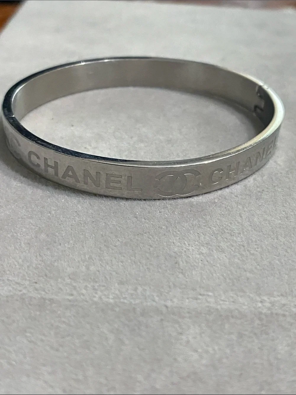 CHANEL Silver-Tone Logo Slim Bangle